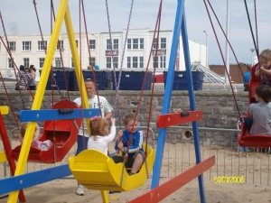 The little 'uns on swing boats